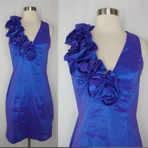Blue Jessica McClintock sleeveless cocktail dress with ruffle detail.